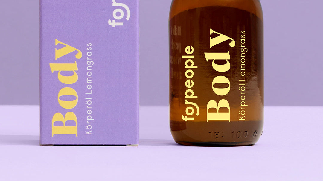 Körperöl Lemongrass von forpeople: Glasflasche neben der Faltschachtel